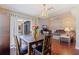 Charming dining area with modern chandelier, hardwood floors, and natural light at 4555 Hannah Ln, St Petersburg, FL 33709