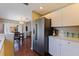 Efficient kitchen featuring stainless steel appliances and bright white cabinetry at 4555 Hannah Ln, St Petersburg, FL 33709