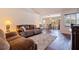 Bright living room with hardwood floors, comfortable seating, and an open layout at 4555 Hannah Ln, St Petersburg, FL 33709