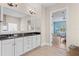 Bathroom featuring a double sink vanity with granite countertop and tiled floor at 4612 W Lowell Ave, Tampa, FL 33629