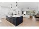 Spacious kitchen featuring a large center island, modern appliances, and an open layout at 4612 W Lowell Ave, Tampa, FL 33629