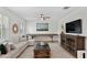 Comfortable living room featuring a media center, pool table, and cozy seating at 4612 W Lowell Ave, Tampa, FL 33629