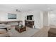 Spacious living room with a pool table, media center, and comfortable seating area at 4612 W Lowell Ave, Tampa, FL 33629