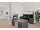 Well-lit office with a large desk, ample storage, and a view to the staircase at 4612 W Lowell Ave, Tampa, FL 33629