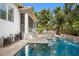 Gorgeous pool with a sitting area and outdoor grill at 4612 W Lowell Ave, Tampa, FL 33629