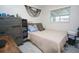 Inviting bedroom with dresser, bed, modern decor, and neutral color scheme for a comfortable retreat at 5205 98Th N Ter, Pinellas Park, FL 33782