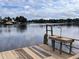 Waterfront view from private dock complete with sink area and faucet, offering serene views and convenience at 5445 Manatee Point Dr, New Port Richey, FL 34652