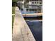 Beautiful waterfront property featuring a private dock for boating and enjoying water activities at 5445 Manatee Point Dr, New Port Richey, FL 34652