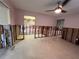 Spacious pink living room with an open floor plan ready for customization at 5445 Manatee Point Dr, New Port Richey, FL 34652