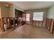 Spacious living room with natural light and doorway to outside at 5445 Manatee Point Dr, New Port Richey, FL 34652