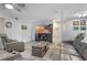 Cozy living room offers plush seating, a large-screen TV, and a welcoming atmosphere at 606 Brentwood Pl, Brandon, FL 33511