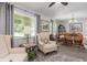 Open floor plan with inviting living room and dining area, featuring stylish decor at 606 Brentwood Pl, Brandon, FL 33511