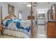 This spacious main bedroom is bright and airy, featuring an en suite bathroom and tiled floors at 606 Brentwood Pl, Brandon, FL 33511