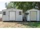 Two storage sheds in the backyard provide ample space for tools, equipment, and outdoor gear at 606 Brentwood Pl, Brandon, FL 33511