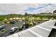 Scenic aerial view highlighting ample parking and lush green surroundings at 6150 Gulfport S Blvd # 302, Gulfport, FL 33707