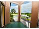 Balcony view of golf course and pond; natural light and picturesque outdoor scenery at 6150 Gulfport S Blvd # 302, Gulfport, FL 33707
