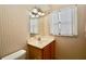 Well-lit bathroom featuring a vanity with ample counter space, mirror, and lighting at 6150 Gulfport S Blvd # 302, Gulfport, FL 33707