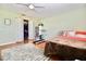 Comfortable bedroom offers ample space, a walk-in closet, and hardwood floors at 6150 Gulfport S Blvd # 302, Gulfport, FL 33707