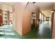 Indoor hallway shows elevator with access to units at 6150 Gulfport S Blvd # 302, Gulfport, FL 33707