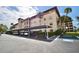 Apartment building with parking and manicured landscaping at 6150 Gulfport S Blvd # 302, Gulfport, FL 33707