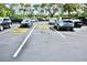 Spacious parking lot with reserved parking for residents and visitors at 6150 Gulfport S Blvd # 302, Gulfport, FL 33707
