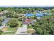 Spacious single Gathering home from above, located in a quiet residential neighborhood at 6436 Huntington Dr, Zephyrhills, FL 33542