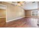 Large bedroom with hardwood floors and plenty of natural light at 6436 Huntington Dr, Zephyrhills, FL 33542