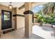 Inviting front porch with an accent door and plenty of space at 6436 Huntington Dr, Zephyrhills, FL 33542