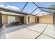 The covered lanai leads to an expansive outdoor area, great for outdoor entertaining at 6436 Huntington Dr, Zephyrhills, FL 33542