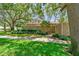 Fenced yard featuring brick wall and greenery at 750 Alda Ne Way, St Petersburg, FL 33704