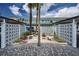 Charming courtyard with seating areas and decorative features offering a tranquil outdoor space at 8 Glencoe Pl # 305, Dunedin, FL 34698