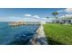 Enjoy waterfront living with a private pier for boating and fishing and lush green space at 8 Glencoe Pl # 305, Dunedin, FL 34698