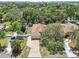 Charming single-Gathering home with a long driveway and mature shade trees at 9917 Prevatt St, Gibsonton, FL 33534