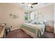 Inviting bedroom with stylish decor, soft lighting, and comfortable bed at 9917 Prevatt St, Gibsonton, FL 33534