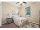 Cozy bedroom with natural light, stylish decor, and comfortable furnishings at 9917 Prevatt St, Gibsonton, FL 33534