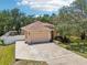 Lovely single-Gathering home with a spacious driveway and well-maintained lawn at 9917 Prevatt St, Gibsonton, FL 33534