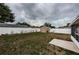 Private backyard with a storage shed and lush greenery, perfect for outdoor activities and relaxation at 10051 82Nd Ln, Seminole, FL 33777