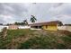 Spacious backyard featuring a storage shed, perfect for enjoying outdoor activities and the beautiful scenery at 10051 82Nd Ln, Seminole, FL 33777