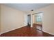 This bedroom features hardwood floors, a double door closet and leads to an ensuite bathroom at 10051 82Nd Ln, Seminole, FL 33777