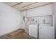 Functional laundry room with washer, dryer, and convenient access to the outside at 10051 82Nd Ln, Seminole, FL 33777