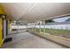 Spacious screened-in patio perfect for outdoor entertaining and relaxation, with views of the backyard at 10051 82Nd Ln, Seminole, FL 33777
