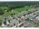 Aerial view of a beautiful suburban neighborhood surrounded by trees and parks at 10202 White Linen Ave, Riverview, FL 33578