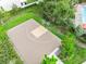 Overhead view of a basketball court in a green space with mature trees and landscaping at 10202 White Linen Ave, Riverview, FL 33578