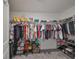 Walk-in closet with ample clothing, shoe storage, and wire shelving to maximize organization at 10202 White Linen Ave, Riverview, FL 33578