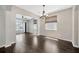 Spacious dining area connected to the living room, offering hardwood floors and natural light at 10819 Newbridge Dr, Riverview, FL 33579
