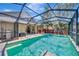 Screened pool with hot tub and lake view at 10819 Newbridge Dr, Riverview, FL 33579