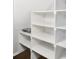 Custom storage area with white shelves at 10819 Newbridge Dr, Riverview, FL 33579
