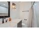 Clean and modern bathroom with a marble-look walk-in shower and stylish fixtures at 1145 53Rd N Ave, St Petersburg, FL 33703