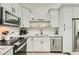 Well-appointed kitchen featuring stainless steel appliances, and granite countertops at 1145 53Rd N Ave, St Petersburg, FL 33703