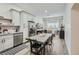 Open concept kitchen and living area featuring modern cabinets and stainless steel appliances at 1145 53Rd N Ave, St Petersburg, FL 33703